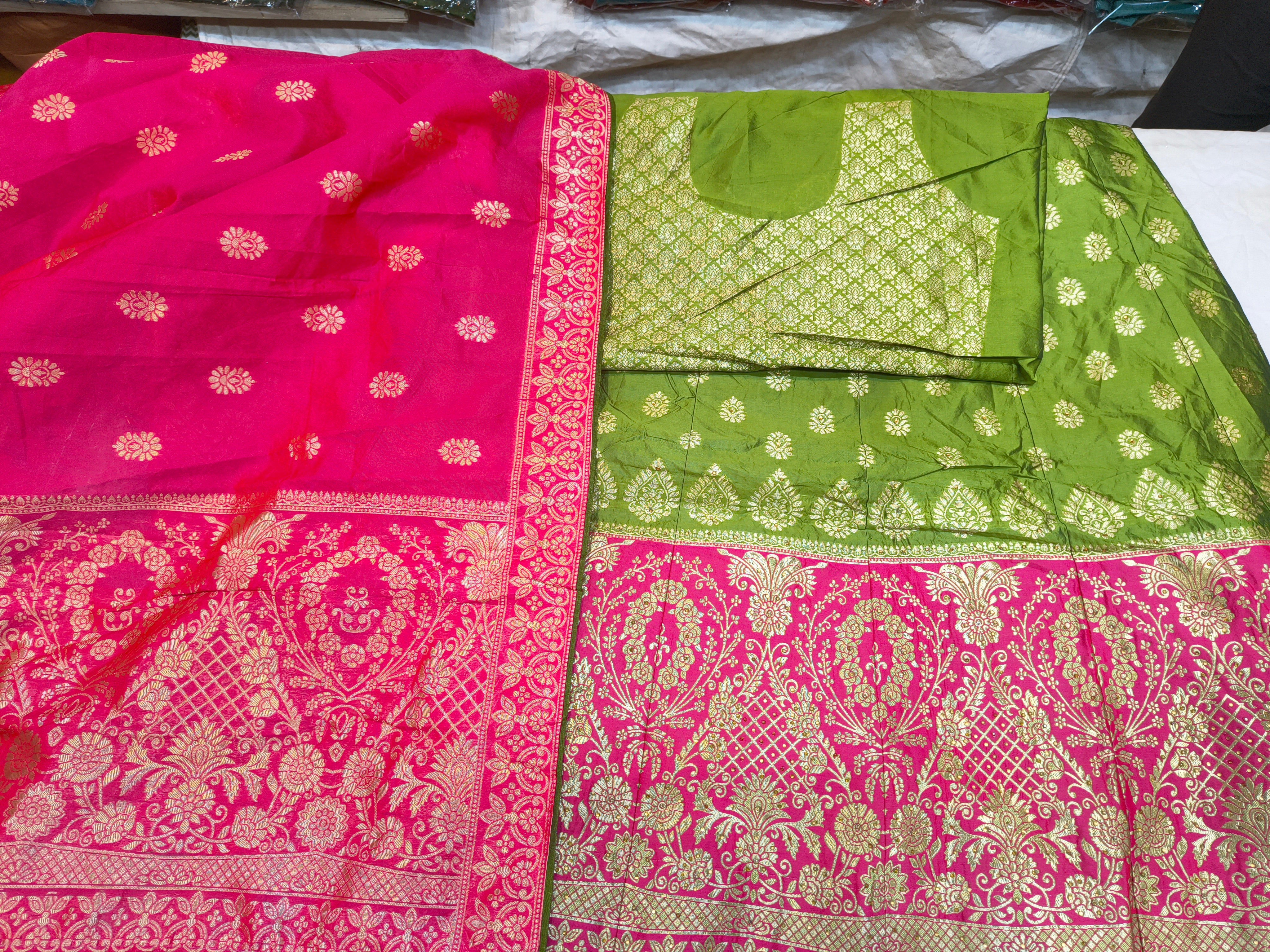 Green Banarasi Lehenga Choli Unstitched with Pink Woven Border & Dupatta