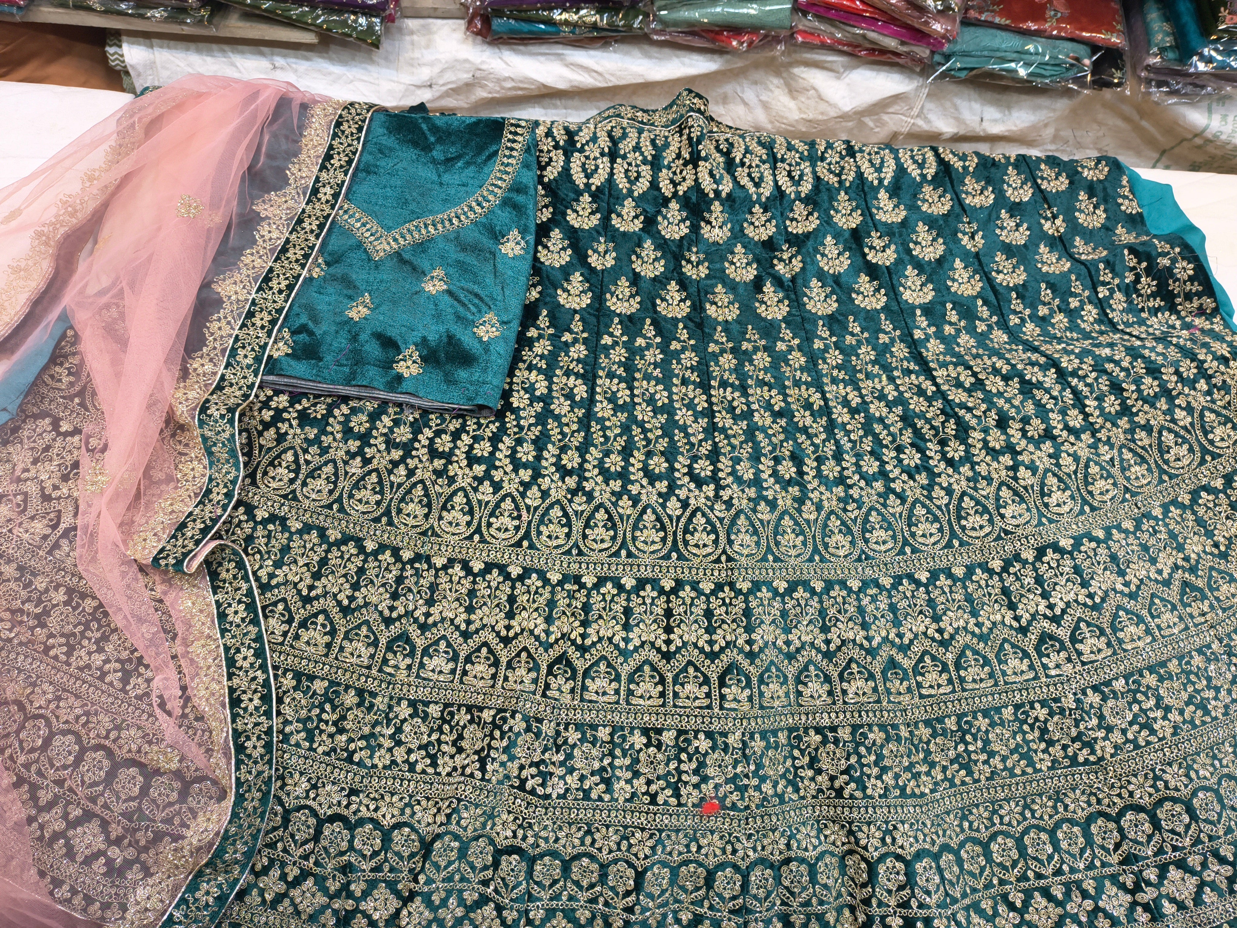 Teal Green Embroidered Velvet Lehenga Choli with Net Dupatta (Unstitched)