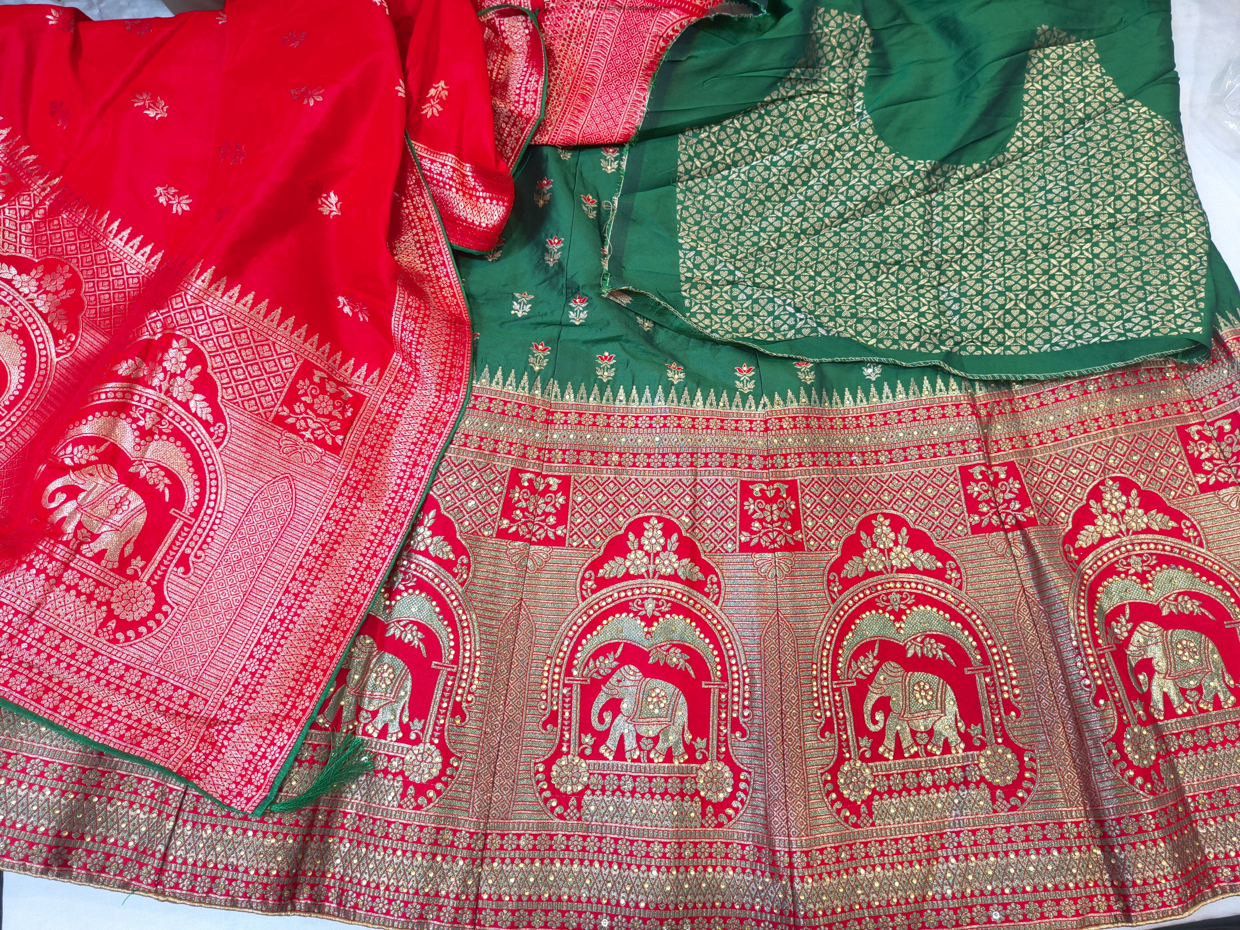 Red & Green Banarasi Silk Unstitched Lehenga Choli with Elephant Zari Border