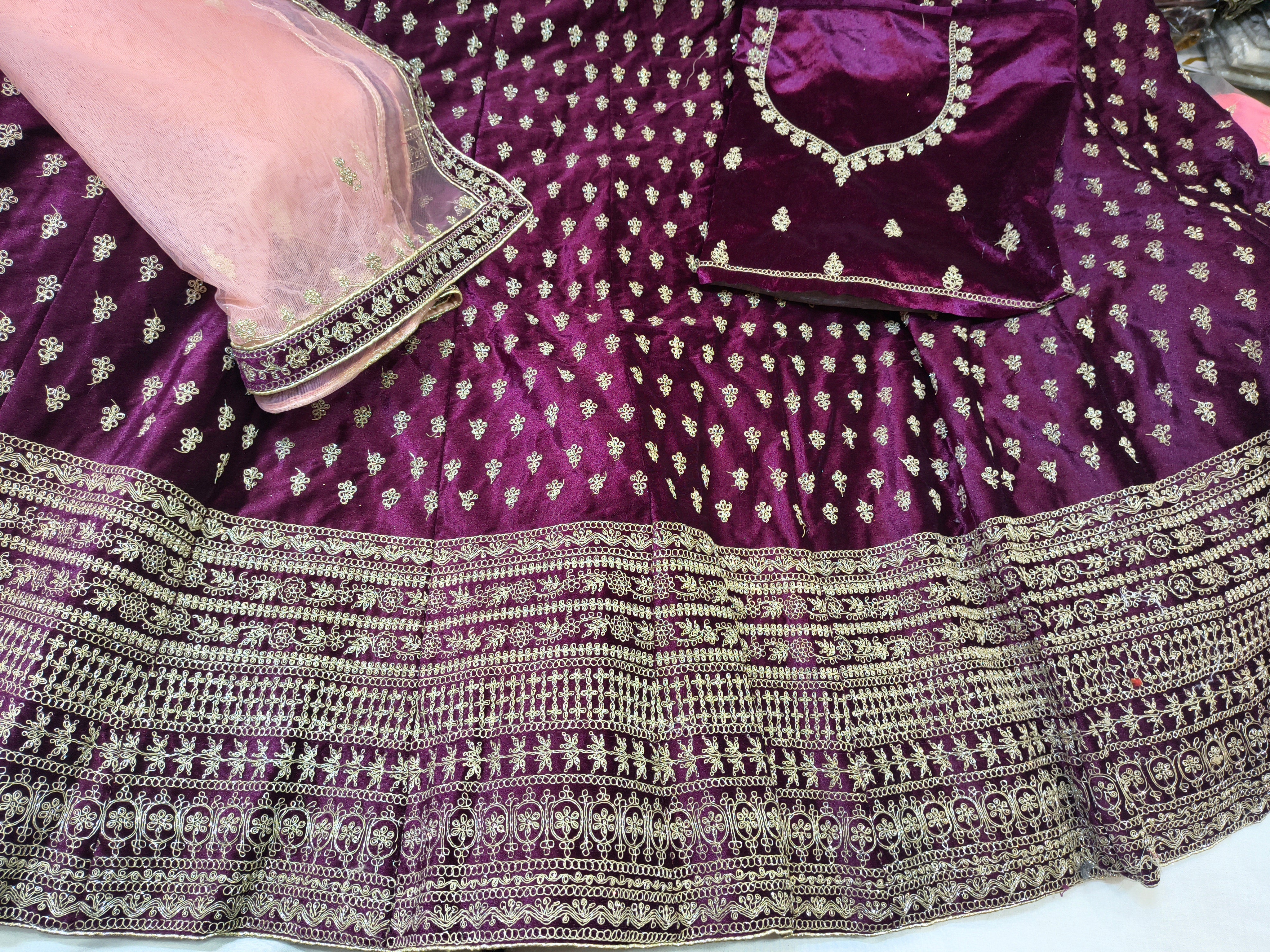 Wine Purple Velvet Lehenga Choli with Gold Stone Work & Net Dupatta (Unstitched)