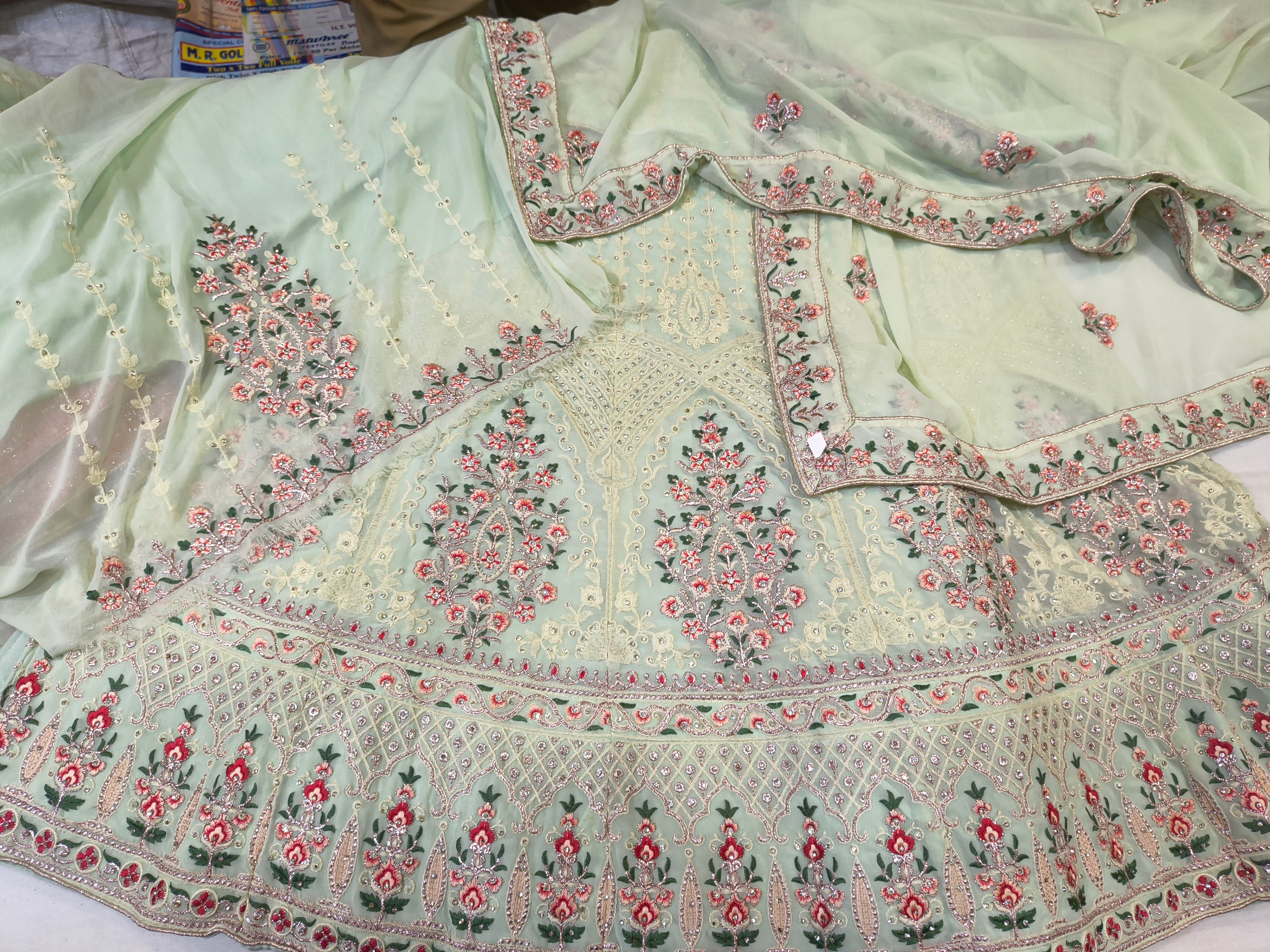 Mint Green Embroidered Georgette Lehenga Choli with Floral Border & Dupatta (Unstitched)